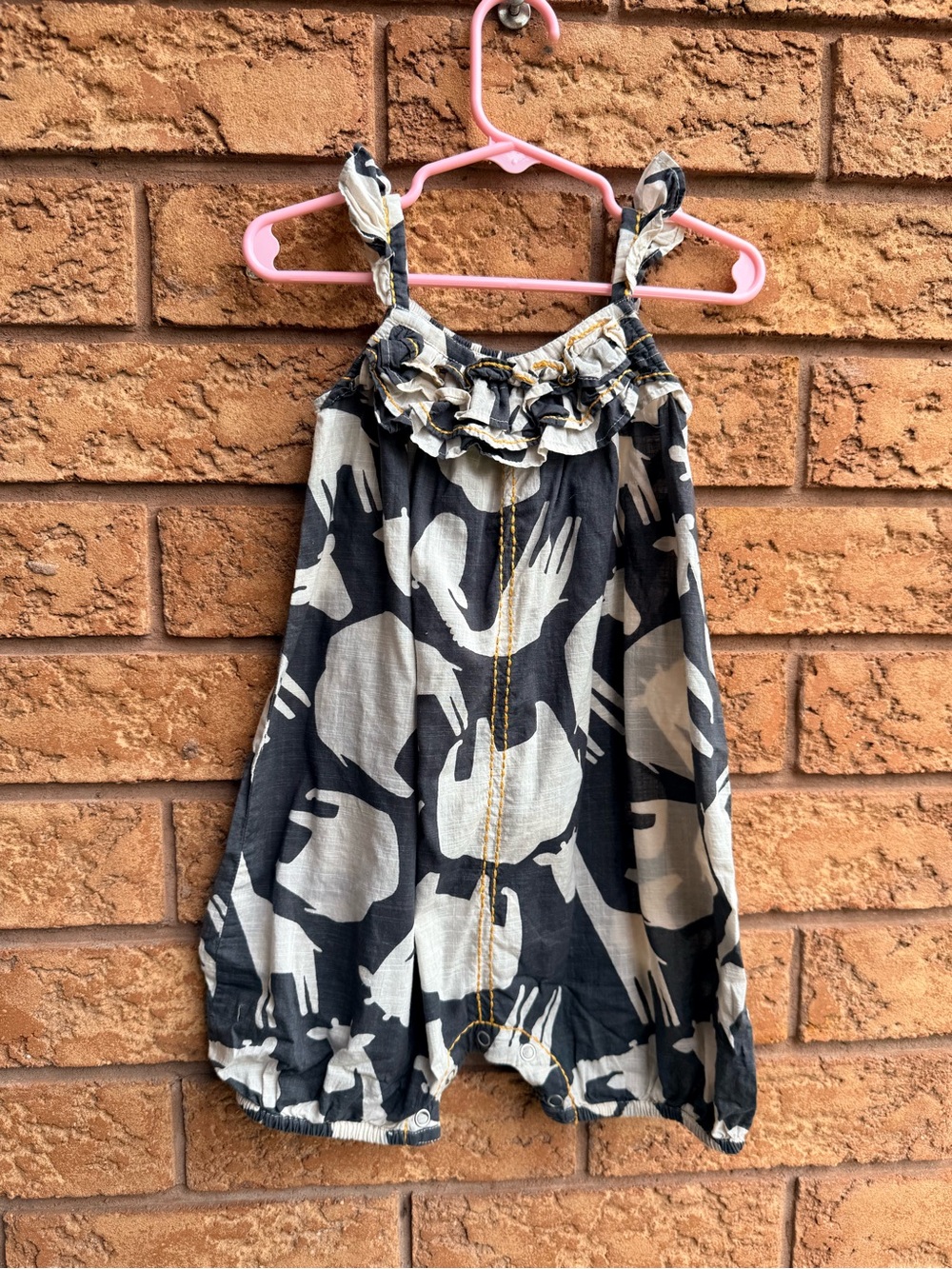 💫4/$25 • NEXT Noir & Ivory Ruffled Sahara Print Ruffle Romper
